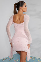 Elegant women's dress with long sleeves made of breathable fabric