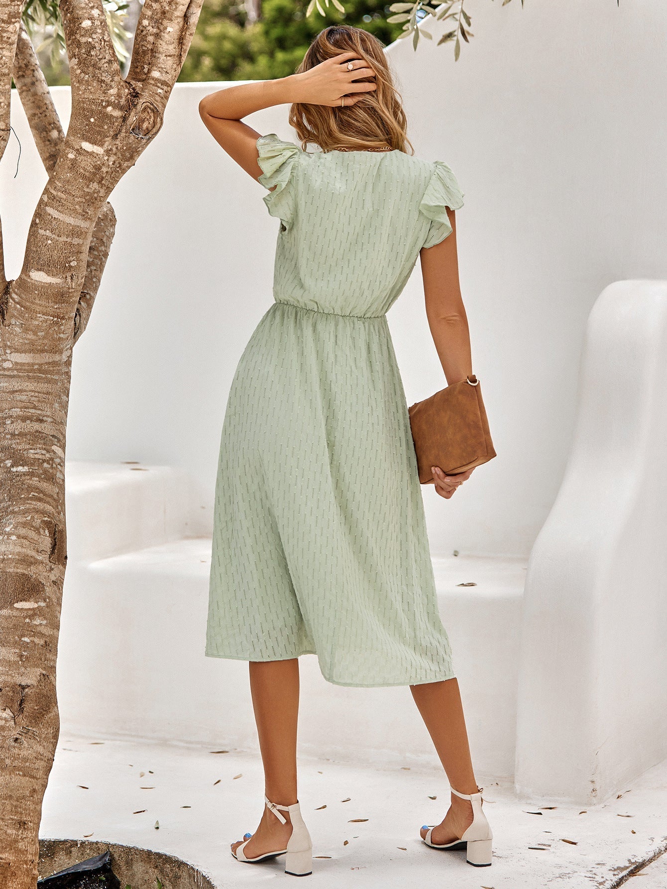 Elegant midi dress for women with ruffled sleeves and V-neck